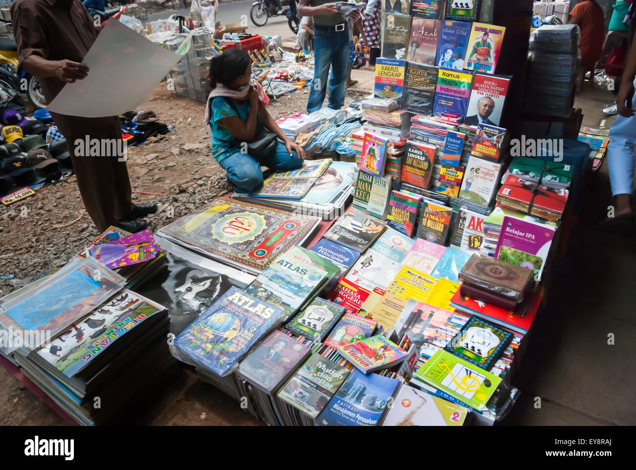A book vendor at a roadside market in Jatinegara, East Jakarta, Jakarta, Indonesia. Stock Photo