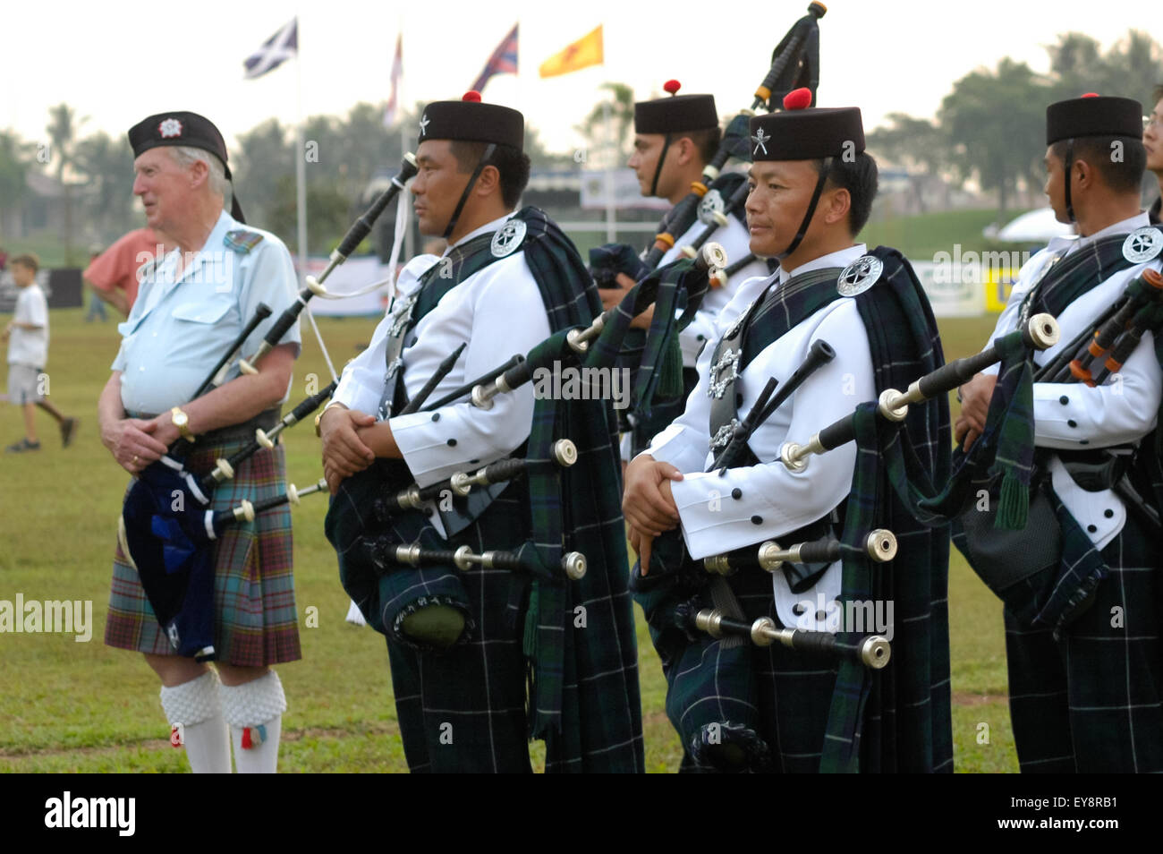 Men getting ready for Scottish traditional musical performance with bagpipes during the 2005 Jakarta Highland Gathering in Karawaci, Banten, Indonesia. Stock Photo