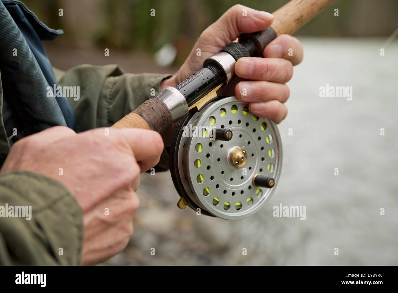 A fisherman fishing in the Chilliwack River with a centerpin reel;  Chilliwack, British Columbia, Canada Stock Photo - Alamy