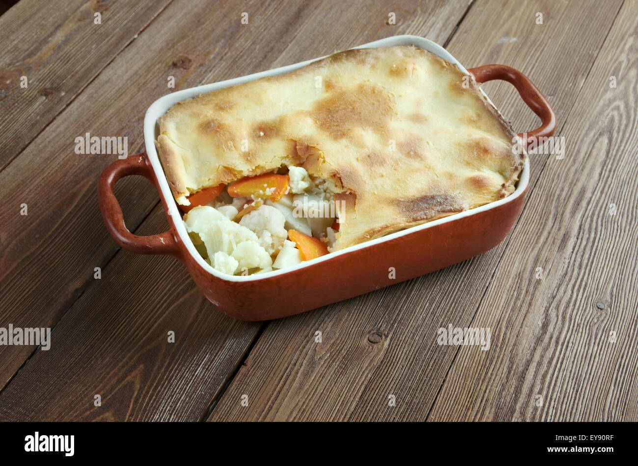 Woolton pie -  dish of vegetables, widely served in Britain. cooking potatoes (or parsnips), cauliflower, swede, carrots and, po Stock Photo