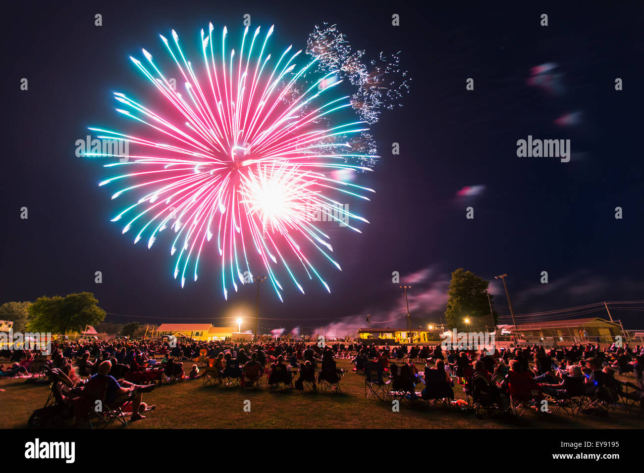 Crowd of people viewing the fourth of July fireworks; Earlville, Iowa