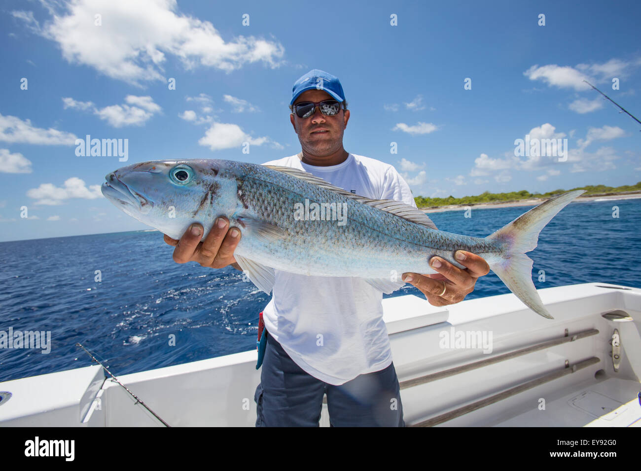 Fisherman with fresh caught Jobfish; Tahiti Stock Photo