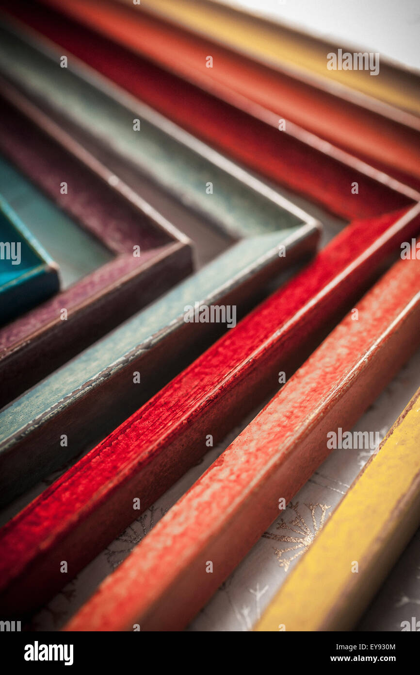Colourful painted wooden picture frames set in side each other; Regina, Saskatchewan, Canada