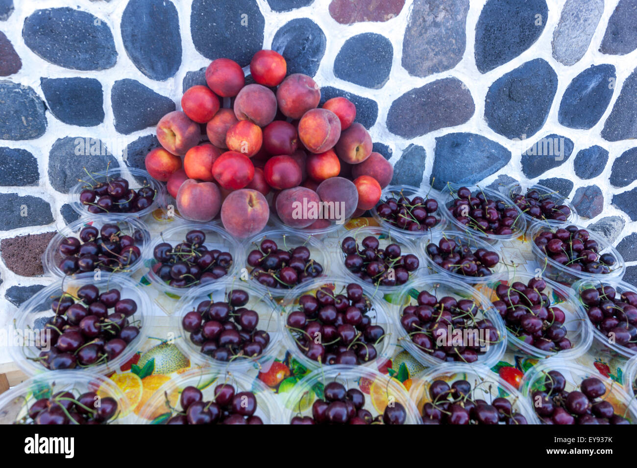 Cherries and peaches on street market, Santorini, Cyclades Islands, Greece, Europe Stock Photo