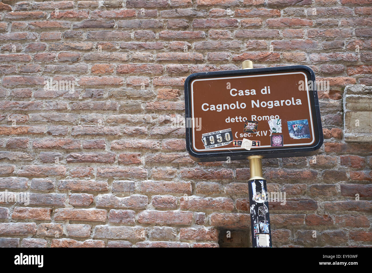 VERONA, ITALY - JULY 13: Detail of sign in front of the address where the fictional house of Romeo would be, in Romeu and Juliet Stock Photo