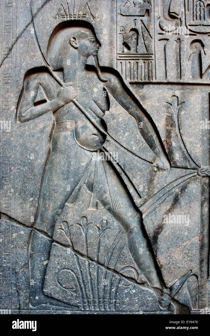 Luxor, Egypt. Temple of Luxor (Ipet resyt): sculpture in the base of the giant statue of king Ramses II. Stock Photo