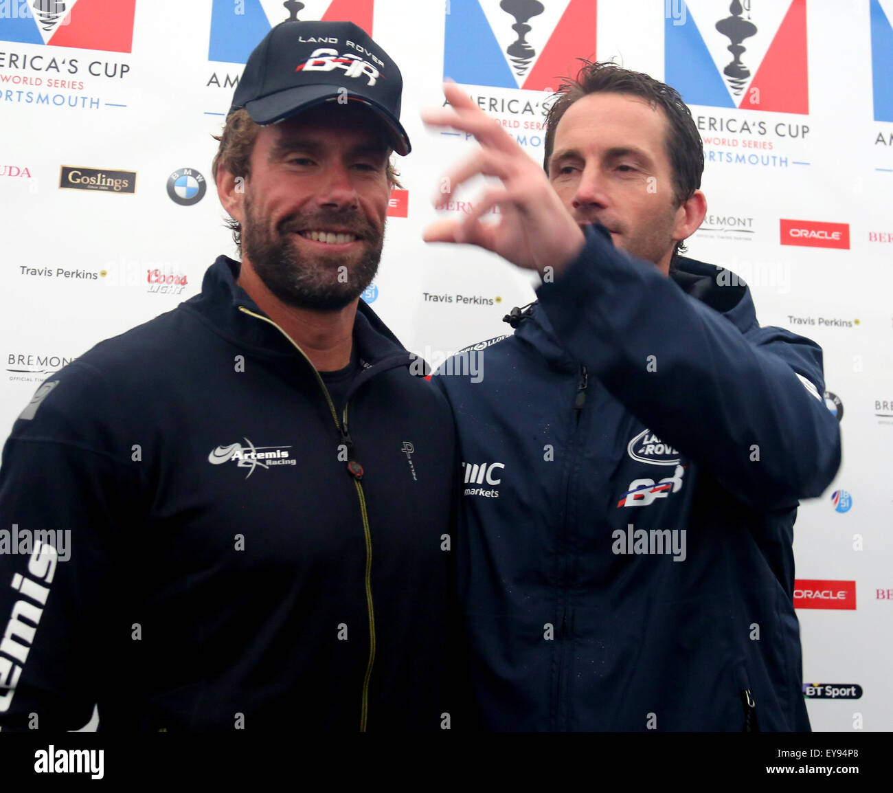 Southsea,Hampshire Friday 24  July 2015.   America Cup on Southsea Common Artemis Racing Skipper: Nathan Outteridge ,BAR – Ben Ainslie Racing   Ben Puts a BAR Landrover hat on Nathan  Daily Press conference   © uknip/ Alamy Live News Credit:  uknip/ Alamy Live News Stock Photo