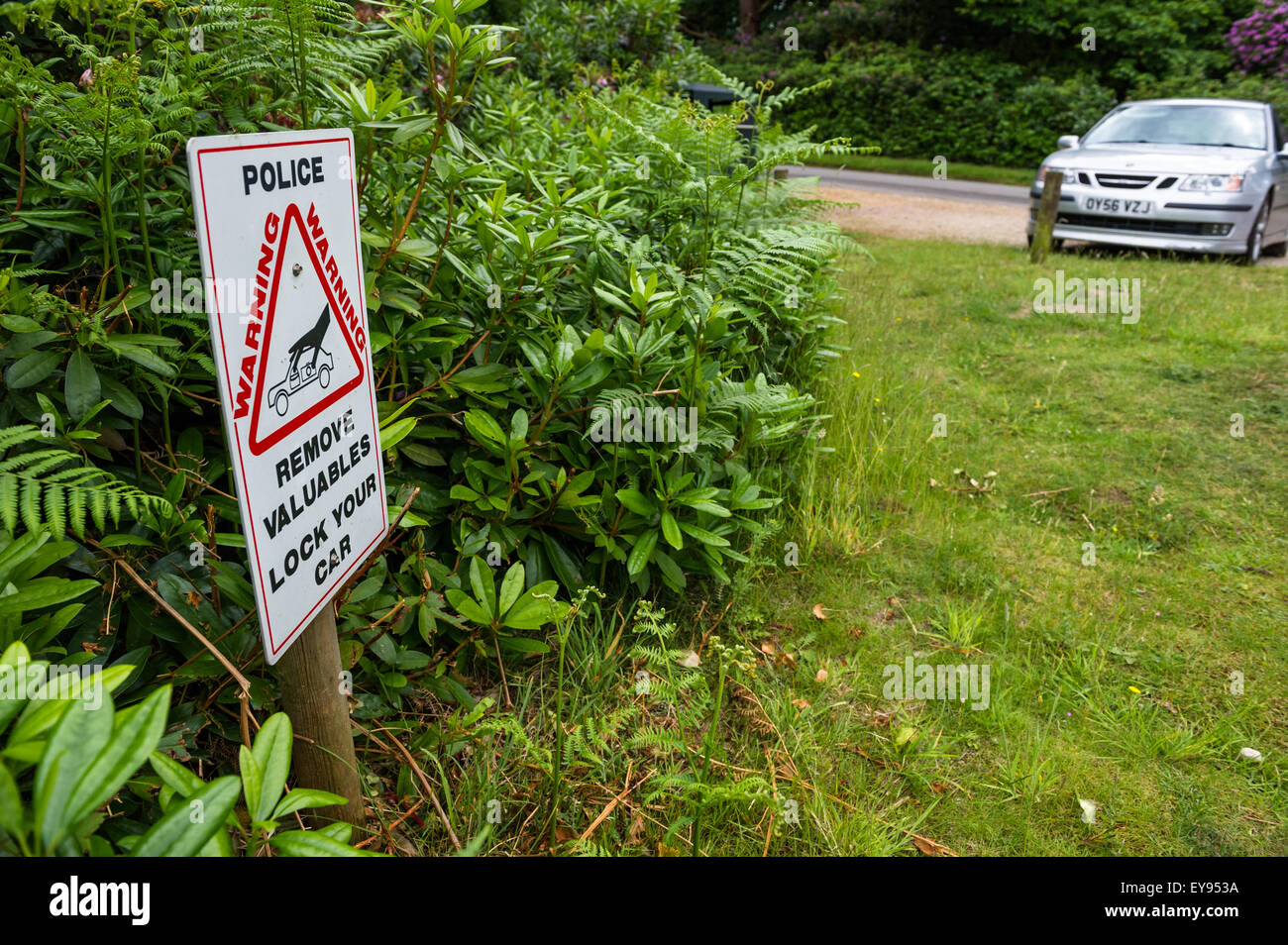 Police warning notice, lock your car, remove valuables. Stock Photo