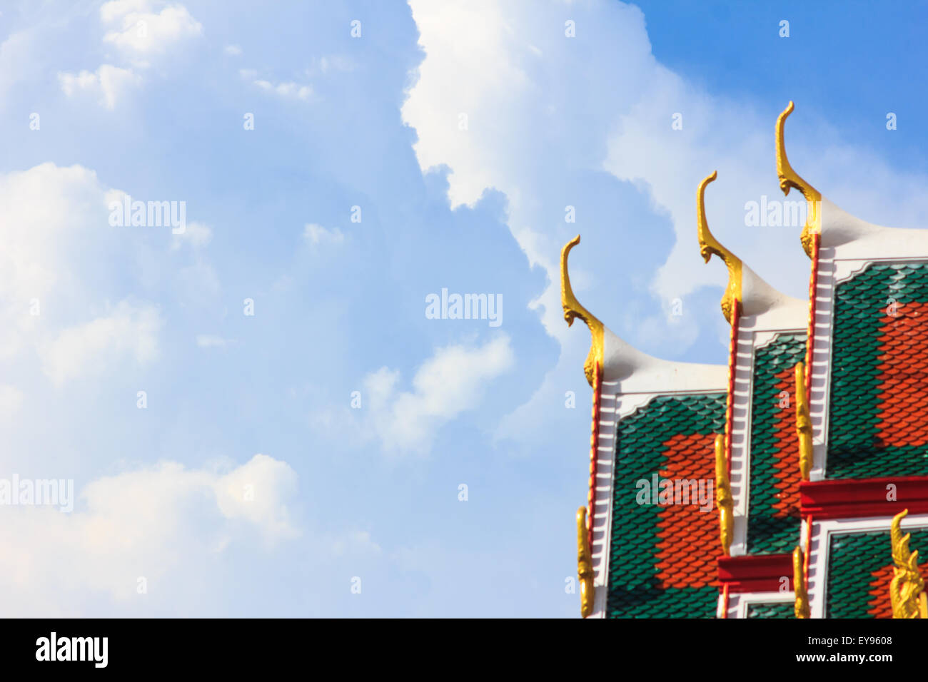 Delicate Thai art at roof top of Buddhist temple in Bangkok, Thailand. Stock Photo