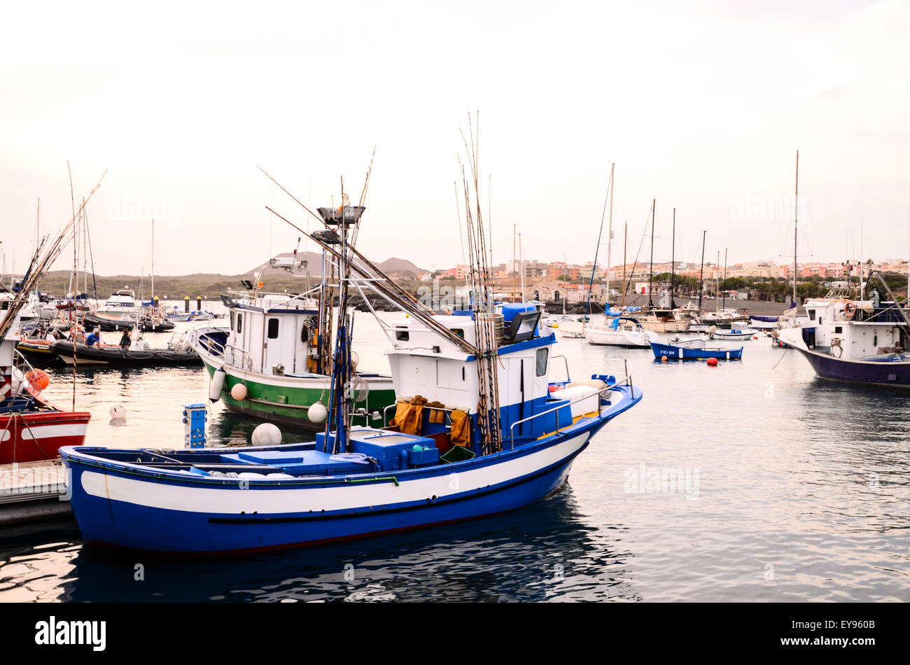 Blue Fishing Boat Stock Photo - Alamy