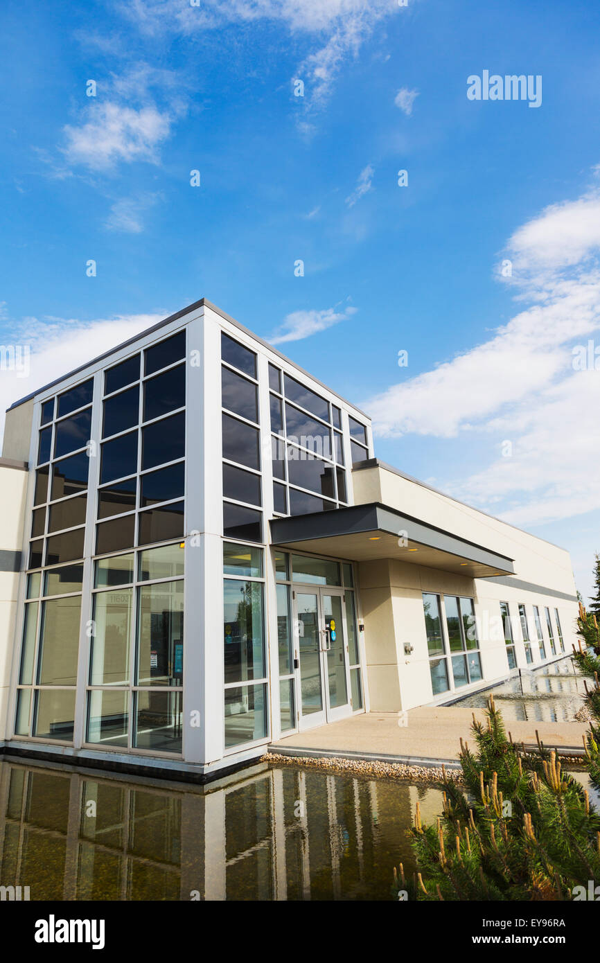 New construction of warehouse building with water feature; Edmonton
