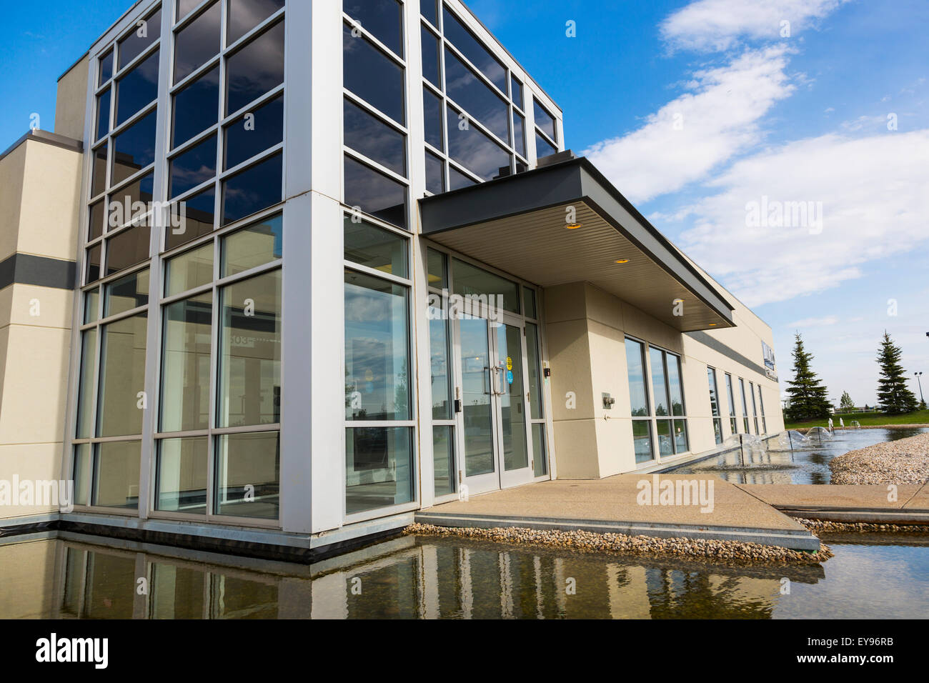 New construction of warehouse building with water feature; Edmonton