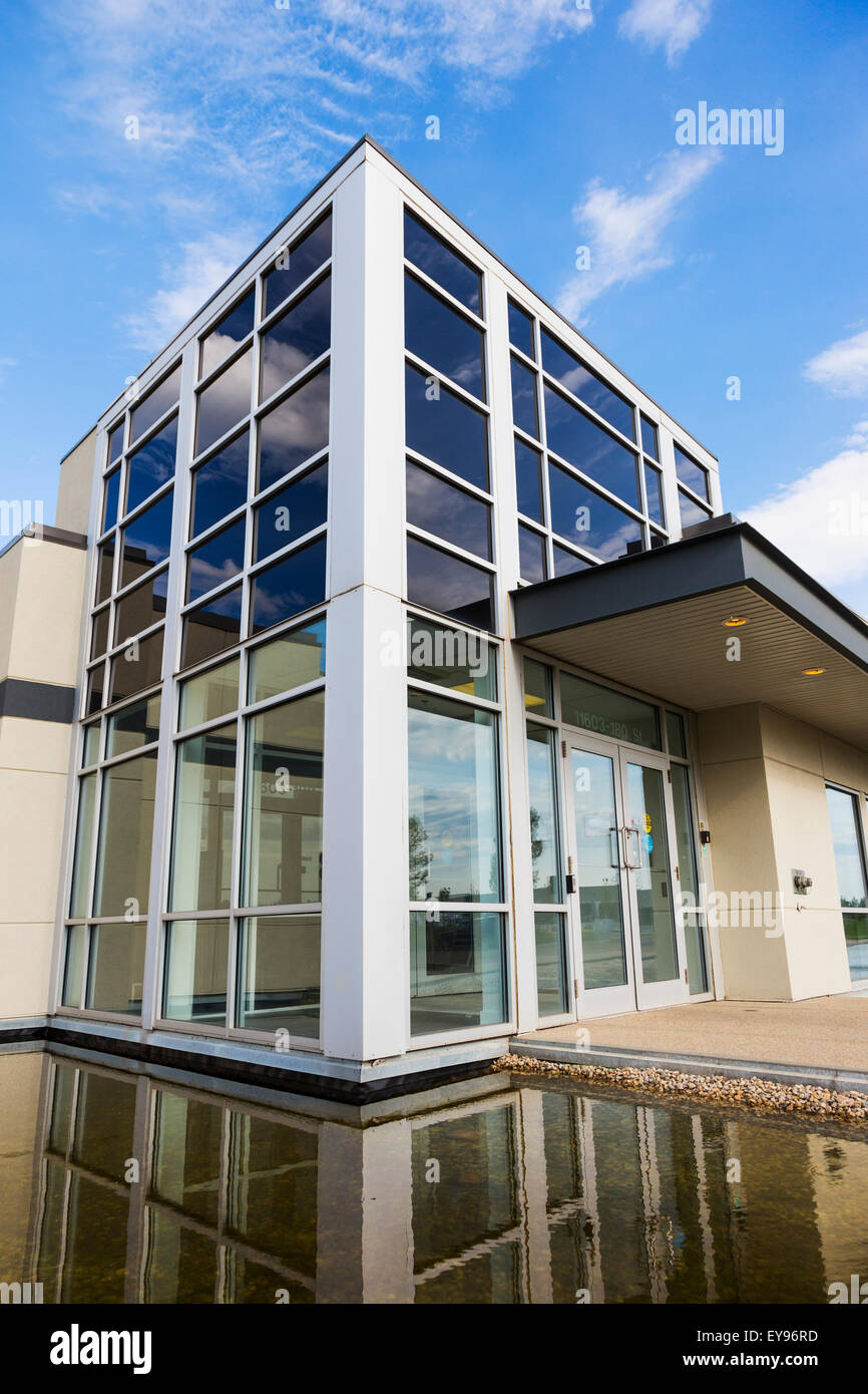 New construction of warehouse building with water feature; Edmonton