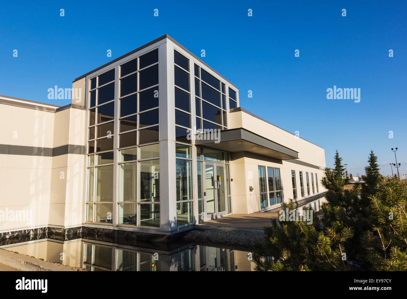 New construction of office warehouse building with water feature