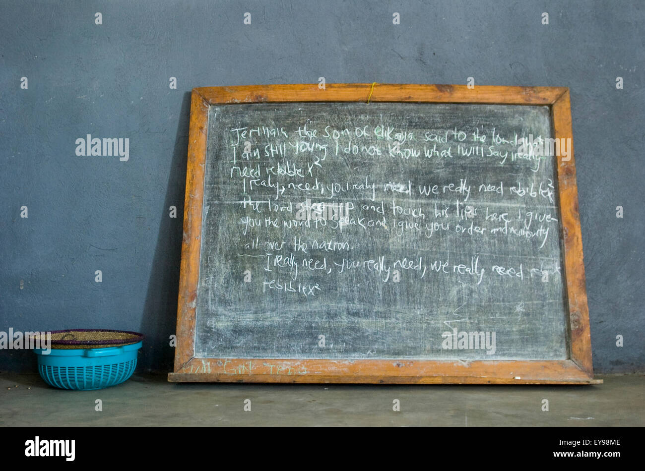 Chalk board ready for an open air church service in Pader, a refugee camp in northern Uganda, Africa. ©Becky Matthews Stock Photo