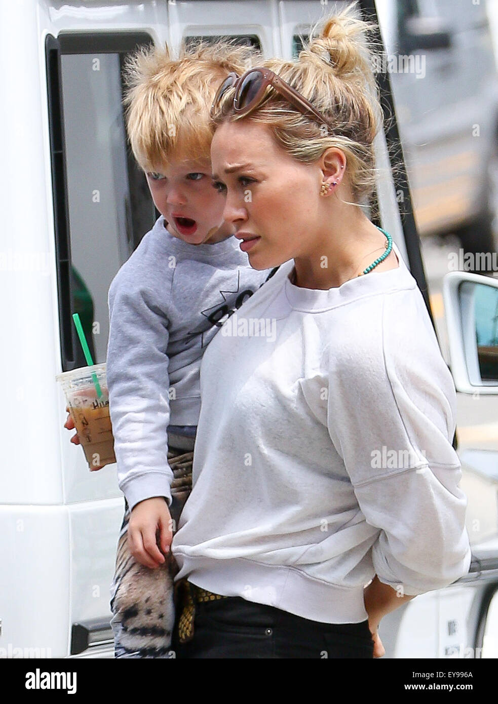 Hilary Duff picks up coffee at Starbucks with her son Luca Comrie(02)
