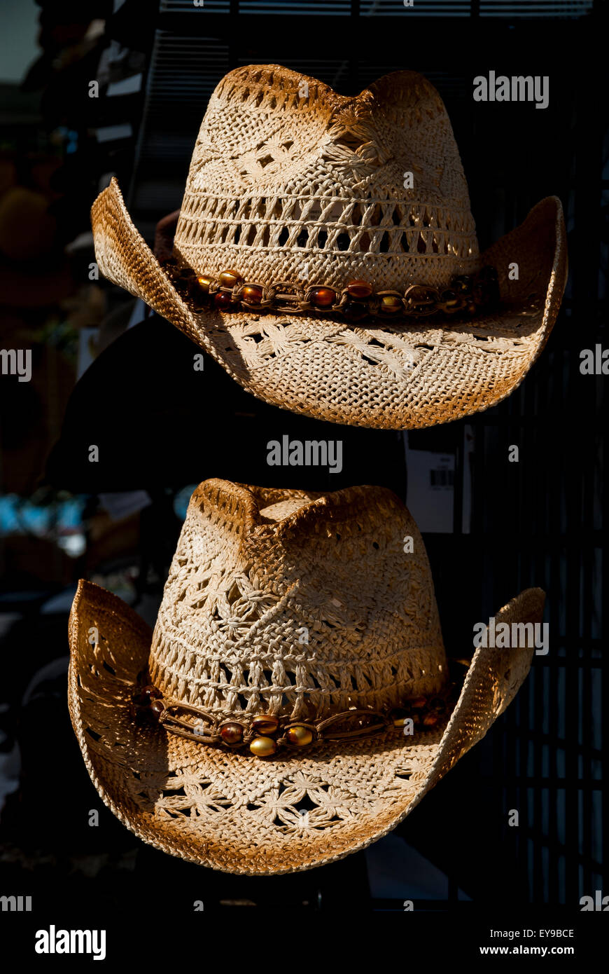 Straw cowboy hats on display Stock Photo Alamy