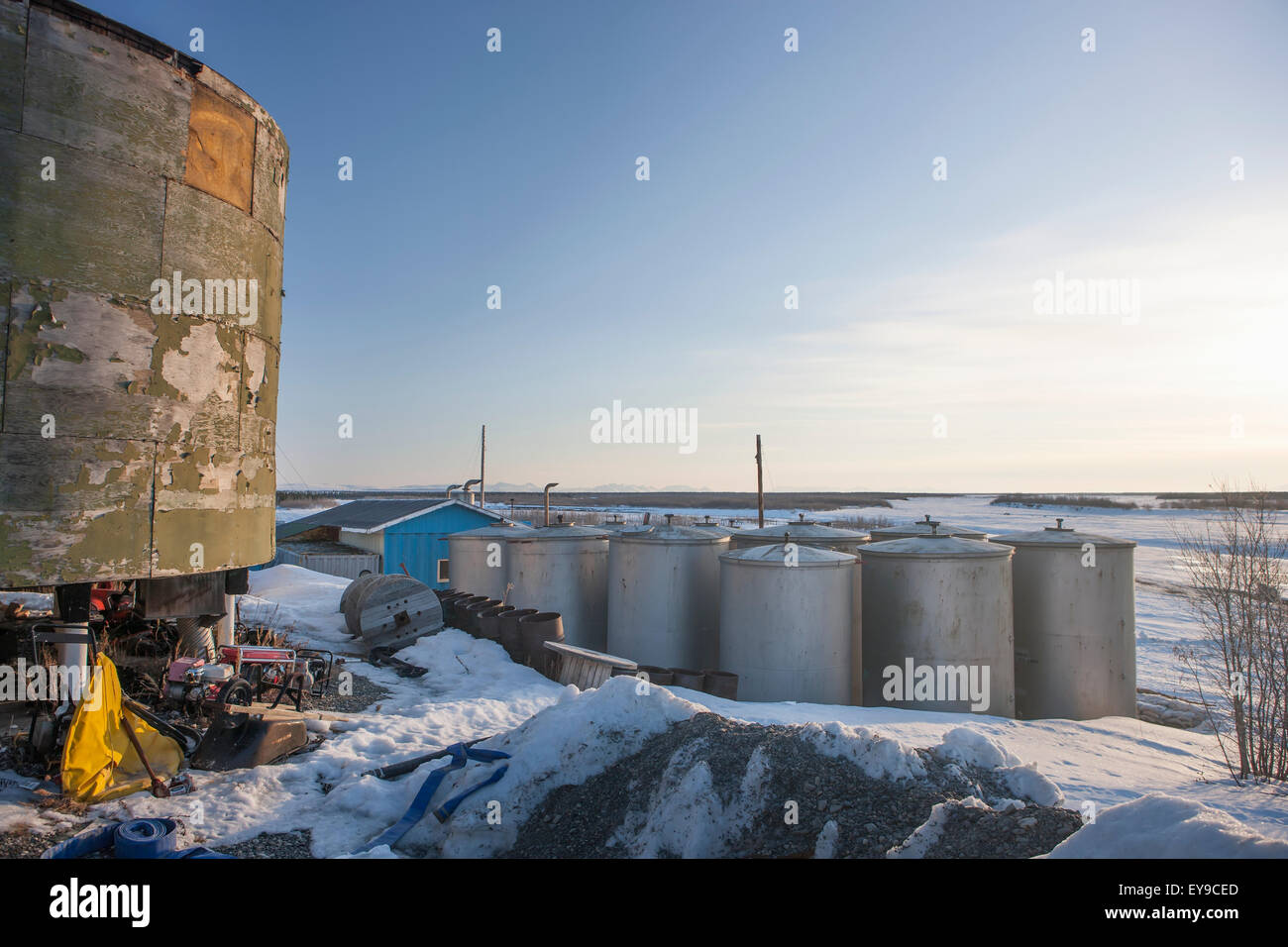 Heating oil tank farm in Noatak during winter, Arctic Alaska, USA Stock Photo