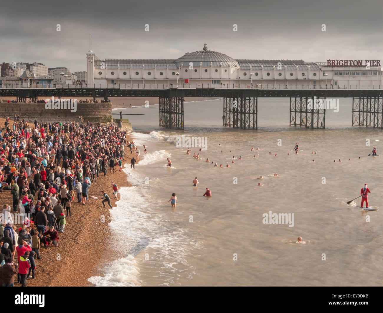 Spectators dressed as santa in the crowd hi-res stock photography and ...