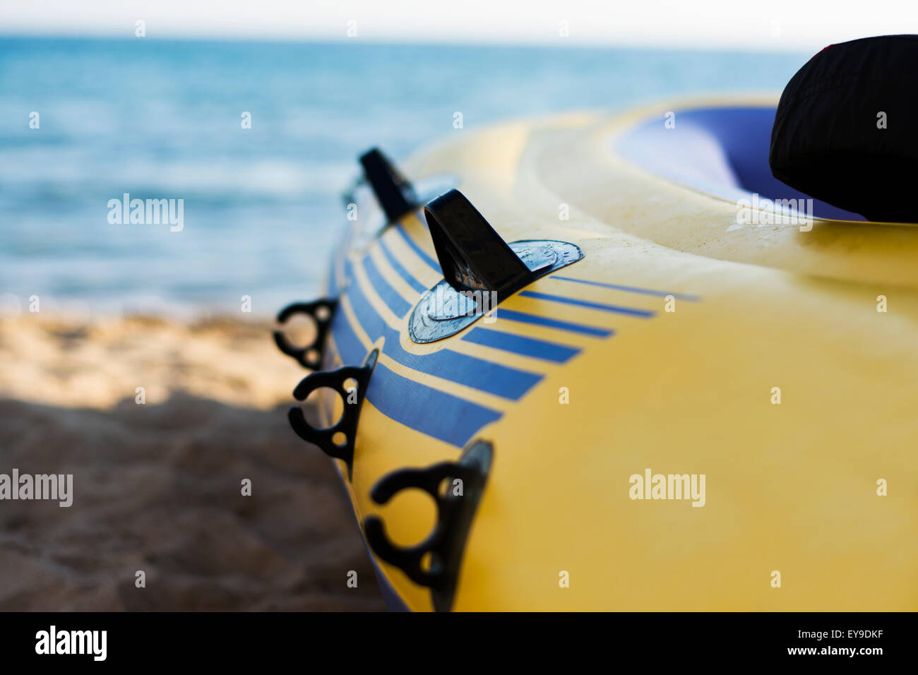 Rubber boat pumped and ready for use on the beach Stock Photo