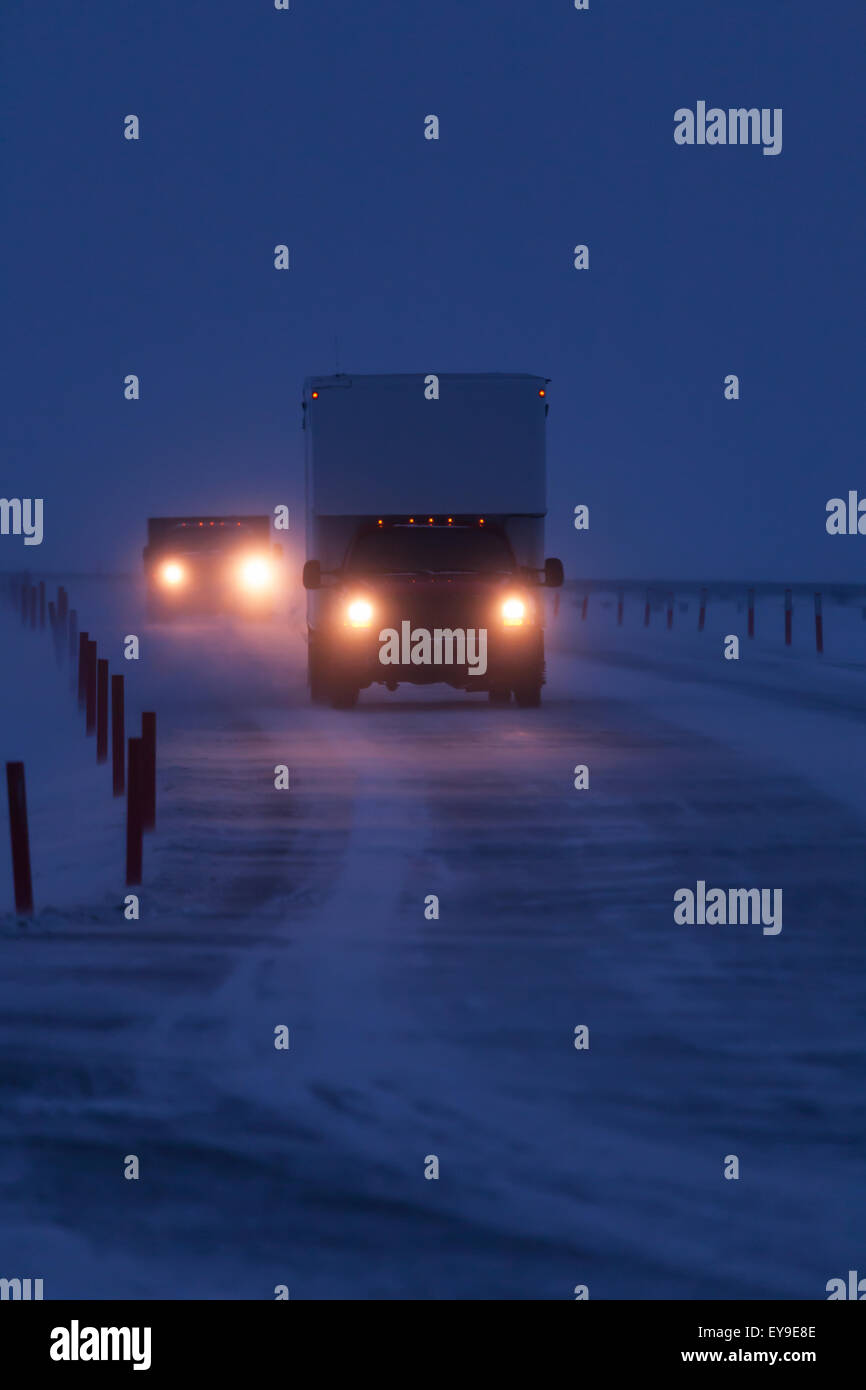 Box Van driving on road in blowing snow, Prudhoe Bay Oil Field, North