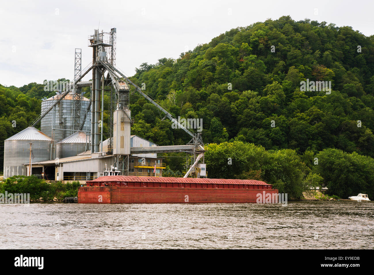 Barge docked at a grain terminal along the Mississippi River; McGregor