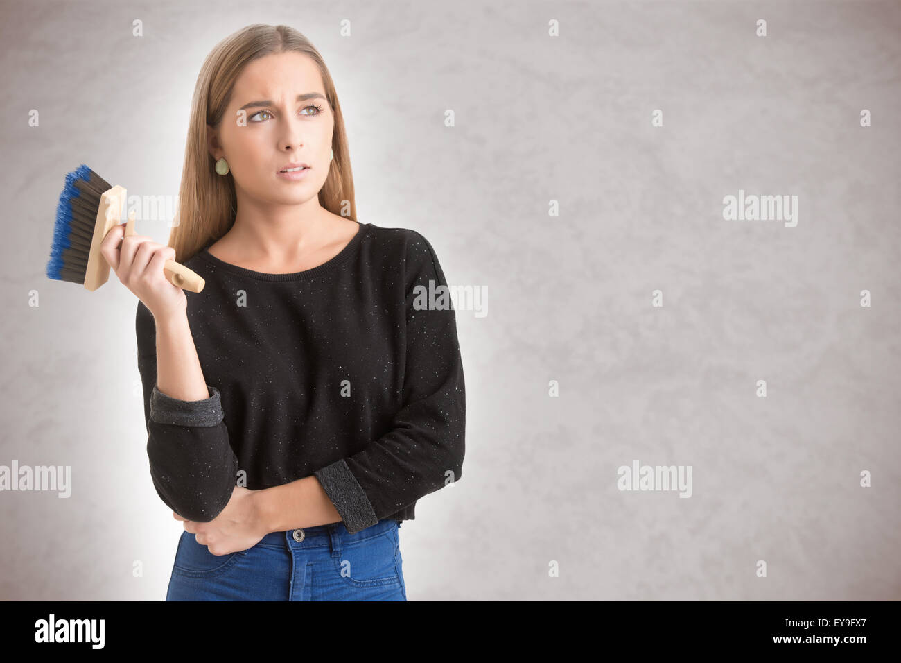Woman painting wall paint brush hi-res stock photography and images - Alamy