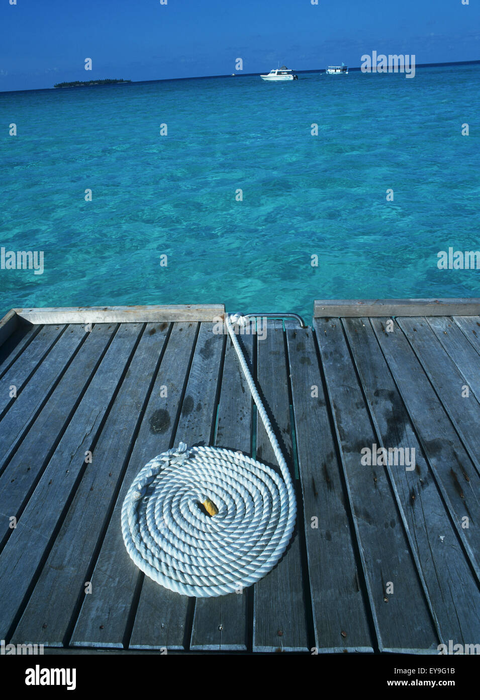 Coiled Rope On Jetty Stock Photo - Alamy