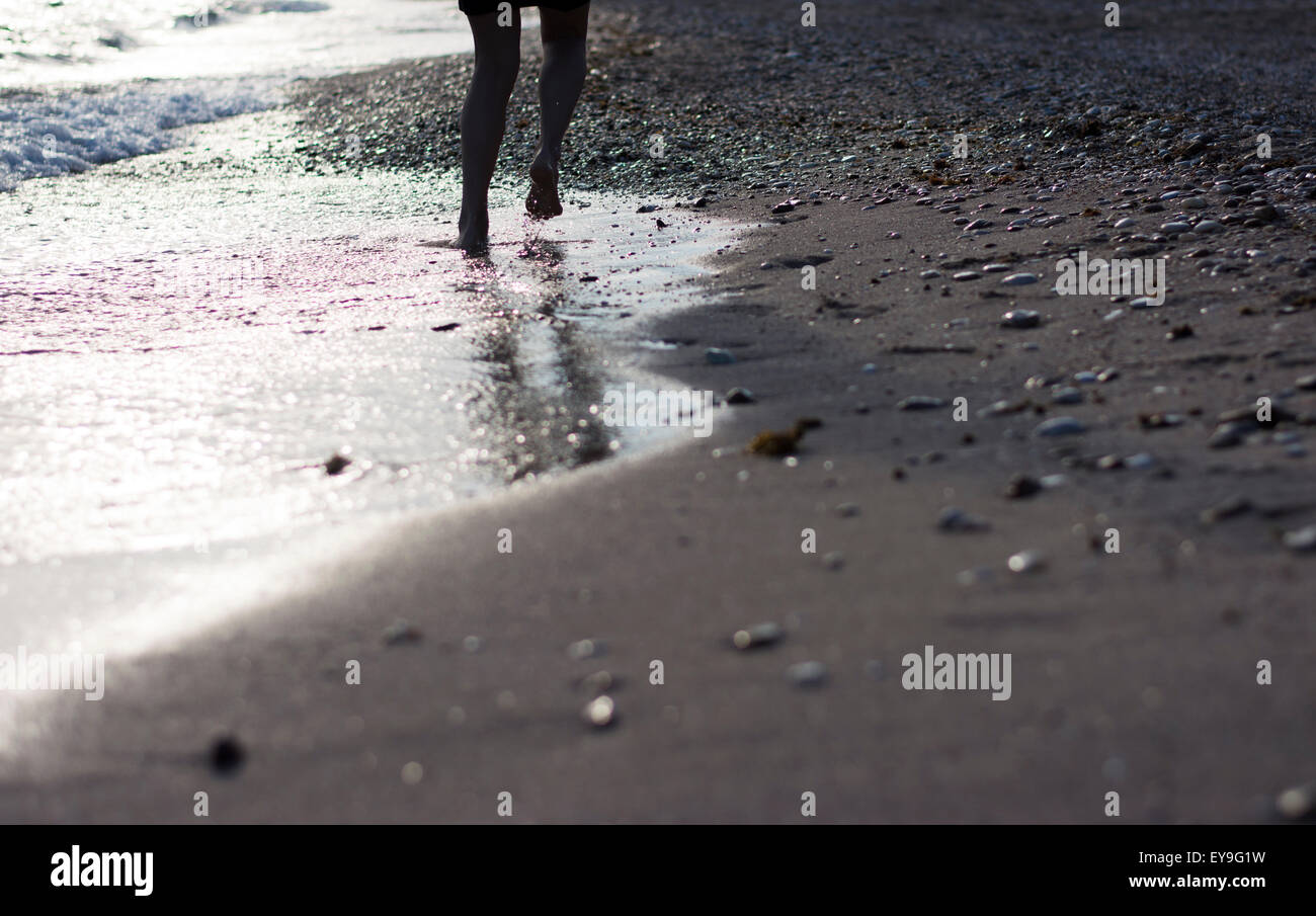 Footprints in the sand on beach Stock Photo - Alamy