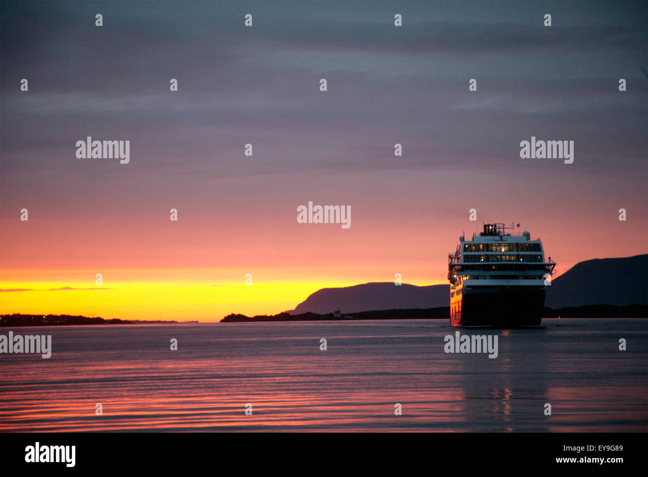Cruise Ship At Sunset Stock Photo - Alamy