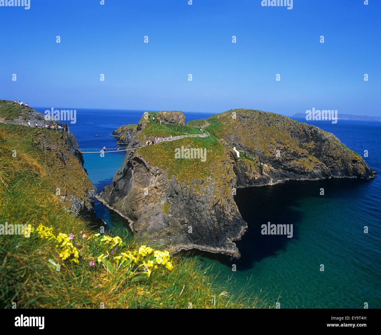 High Angle View Of Rock Formations With A Rope Bridge, Carrick-A-Rede Rope Bridge, County Antrim, Northern Ireland Stock Photo