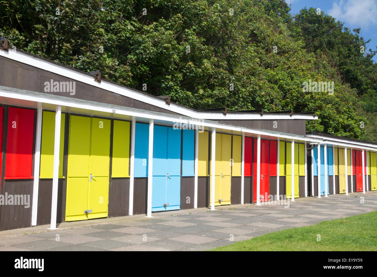 Beach chalets on the royal parade at Filey North Yorkshire UK Stock