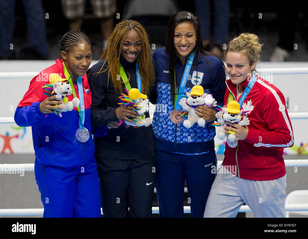 Toronto, Canada. 24th July, 2015. Medalists pose for photos during the awarding ceremony of the women's 69-75kg final match of the boxing event at the 17th Pan American Games in Toronto, Canada, July 24, 2015. Claressa Shields(2nd L) won the gold medal. © Zou Zheng/Xinhua/Alamy Live News Stock Photo