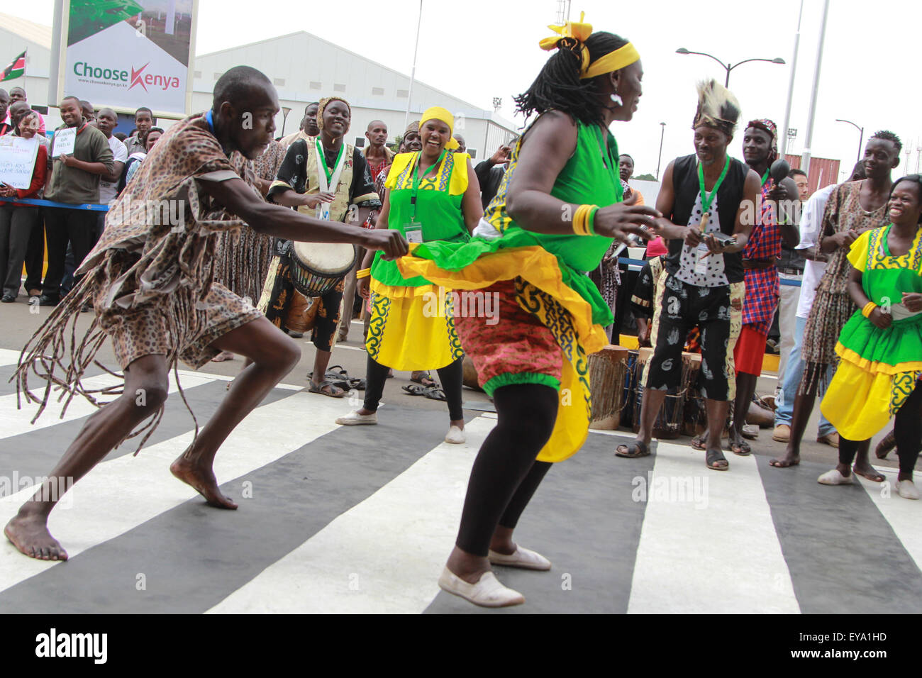 Nairobi, Kenya. 24th July, 2015. Kenyan Traditonal Dancers from Boma Group Enterntains Guest as they arrive Jomo Kenyatta International Airport (JKIA) before the arrival of US president Barack Obama in Nairobi Kenyan capital. US President Barack Obama is on a three-day visit to Kenya, his first to his ancestral homeland since becoming president, he will open Global Entrepreneurship Summit (GES) at the United Nations Office in Nairobi on Saturday. Credit:  Tom Maruko/Pacific Press/Alamy Live News Stock Photo