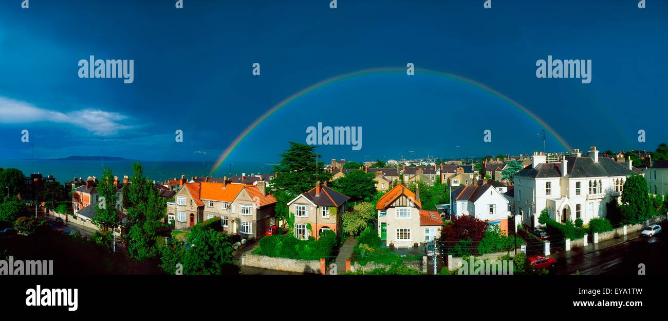 Rainbow Over Housing, Monkstown, Co Dublin, Ireland Stock Photo