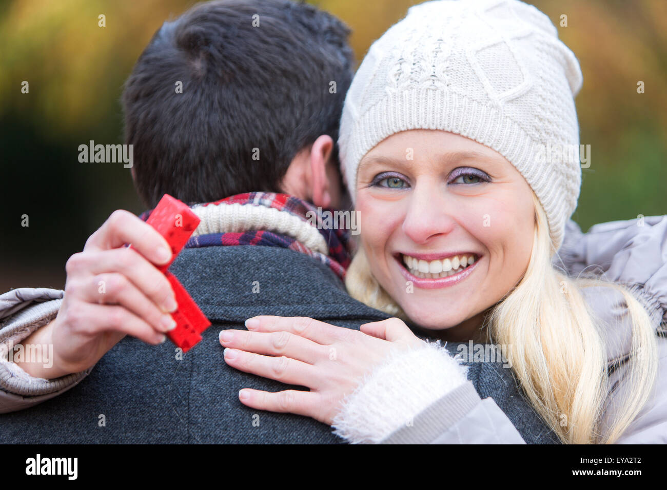 View of a Young attractive man propose marriage to his love Stock Photo