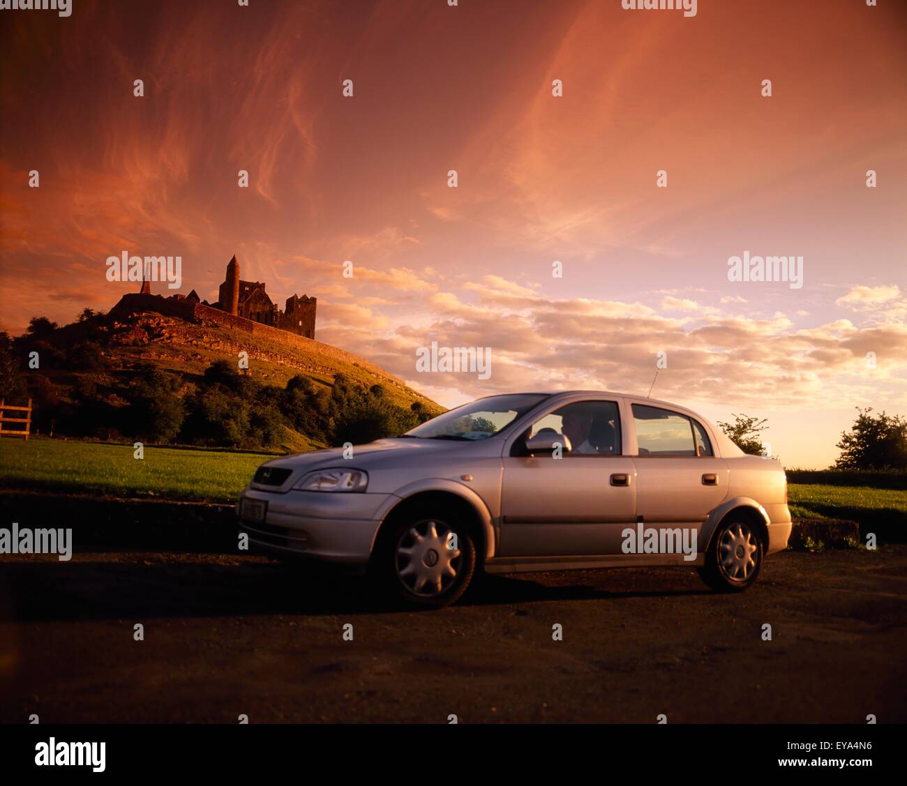 Rock Of Cashel, Co Tipperary, Ireland; Woman Driving A Car Stock Photo