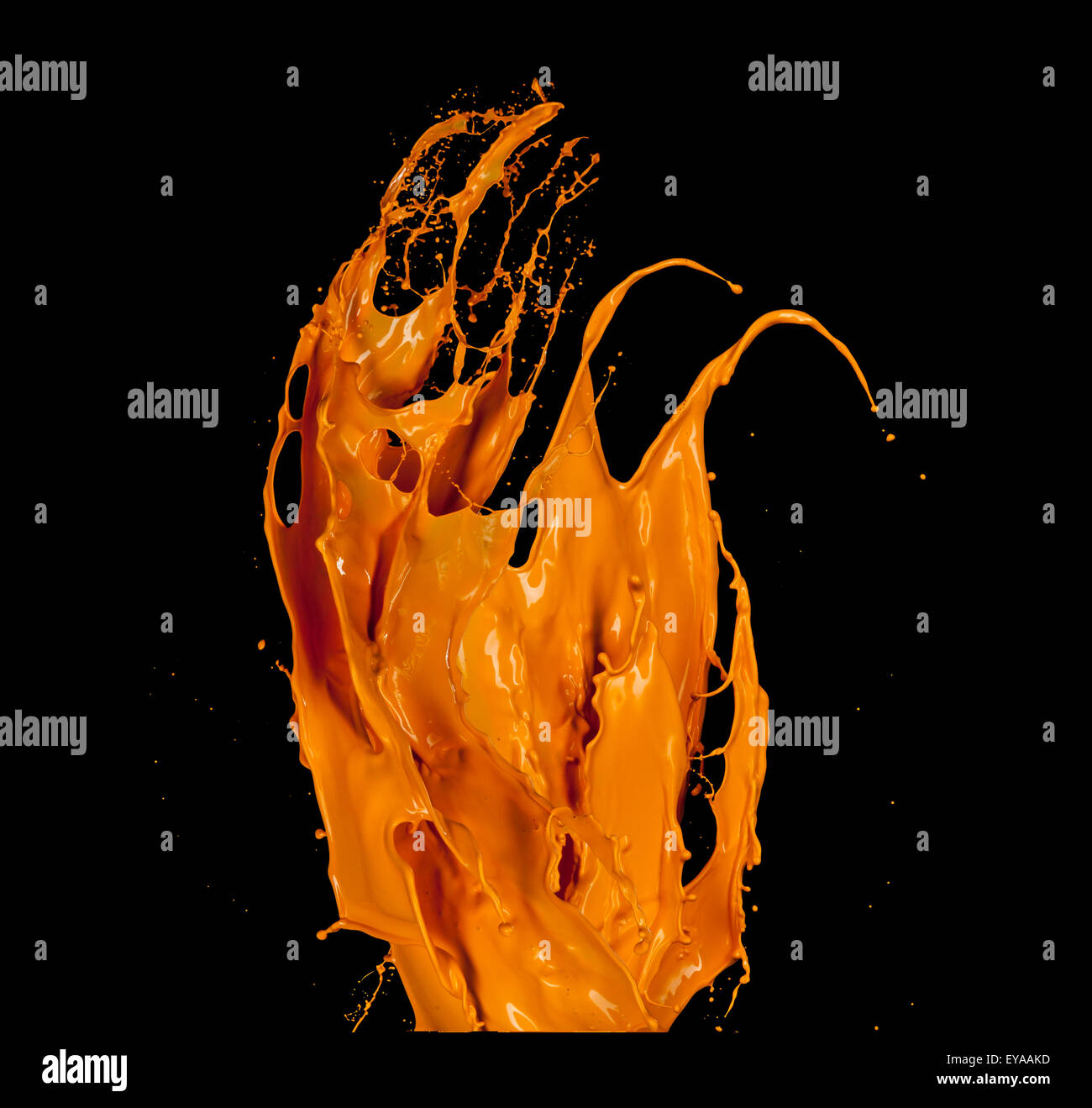 Orange paint splash on black background Stock Photo Alamy