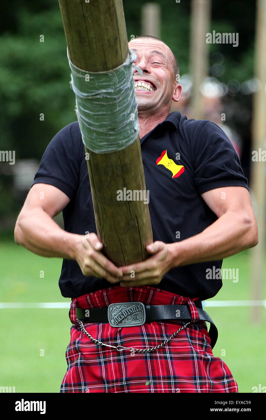 Berlin, Germany. 25th July, 2015. A man wearing kilt participates in