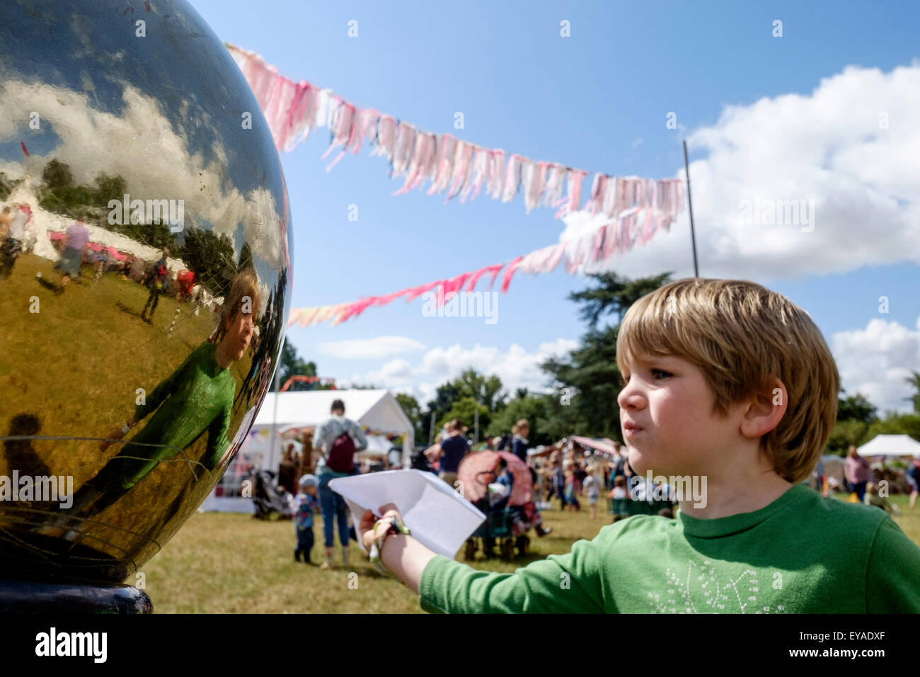 Charlton Park, Wiltshire, UK. 25th July, 2015. Atmosphere at WOMAD (World of Music, Arts and Dance)  Festival at Charlton Park on 25/07/2015 at Charlton Park, Malmesbury.  Flying paper aeroplanes in the chlidrens festival area. Picture by Julie Edwards/Alamy Live News Stock Photo