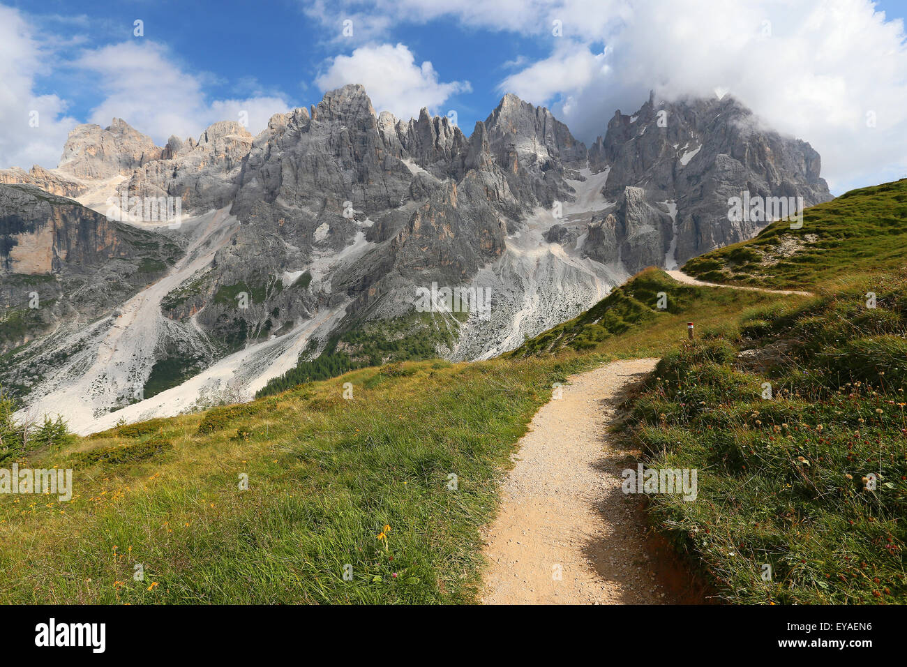 Hiking trail. The Pale di San Martino mountain group. Cimon della Pala, Cima Vezzana, Bureloni peaks. The Trentino Dolomites. Italian Alps. Europe. Stock Photo