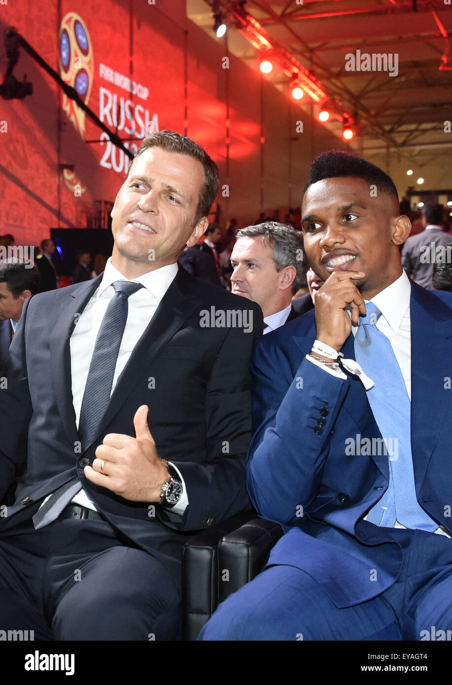 St. Petersburg, Russia. 25th July, 2015. Manager of the German national team Oliver Bierhoff (L) and soccer player Samuel Eto'o sit ahead of the Preliminary Draw for the FIFA World Cup 2018, in St. Petersburg, Russia, 25 July 2015. Photo: MARCUS BRANDT/dpa Credit:  dpa picture alliance/Alamy Live News Stock Photo