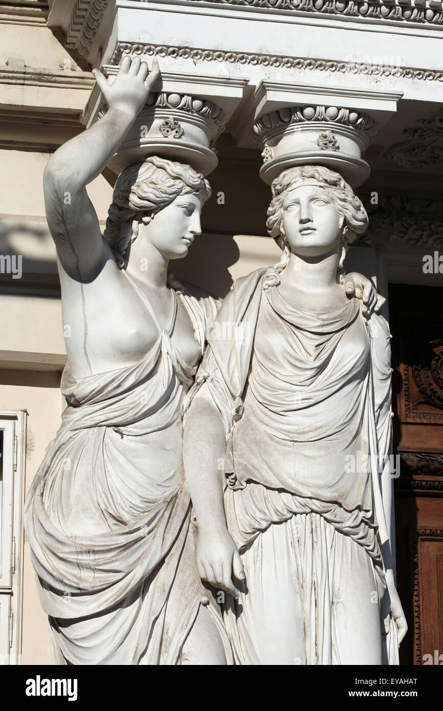 Two caryatids by Austrian sculptor Franz Anton von Zauner support the main entrance to the Palais Pallavicini at Josefsplatz in Vienna, Austria. Stock Photo