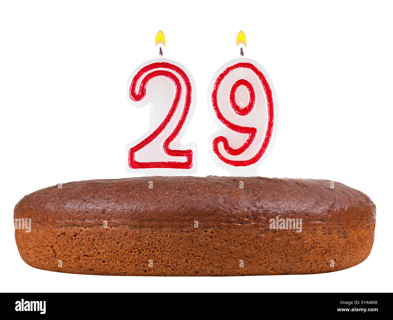birthday cake with candles number 29 isolated on white background Stock Photo