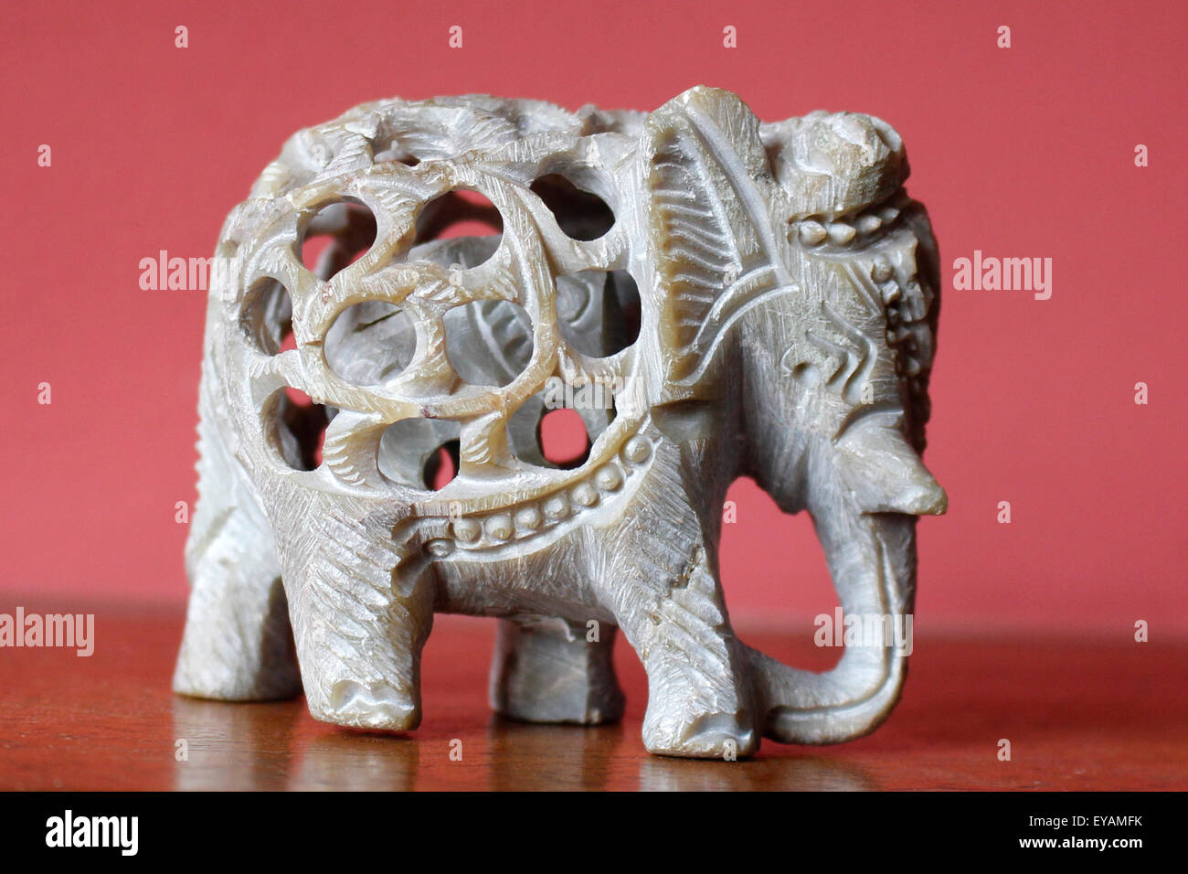 Baby elephant in an elephant figurine from a single stone. Thai ...