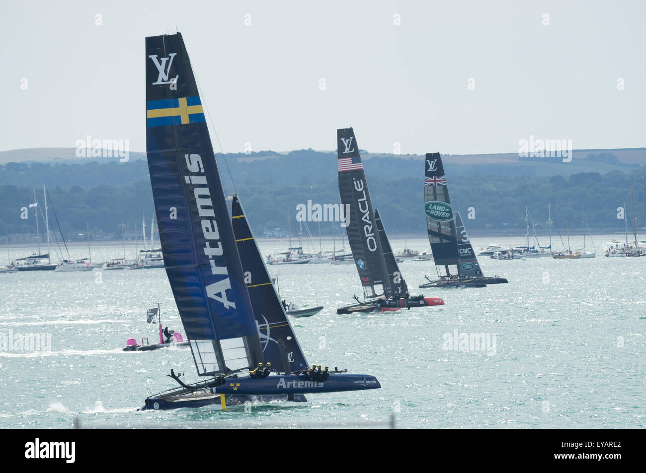 The Solent, UK. 25th July, 2015. Oracle Team USA races Artemis Racing and Land Rover Ben Ainslie Racing in the first round of the Americas Cup World Series. Credit:  Esme Vangelis/Alamy Live News Stock Photo