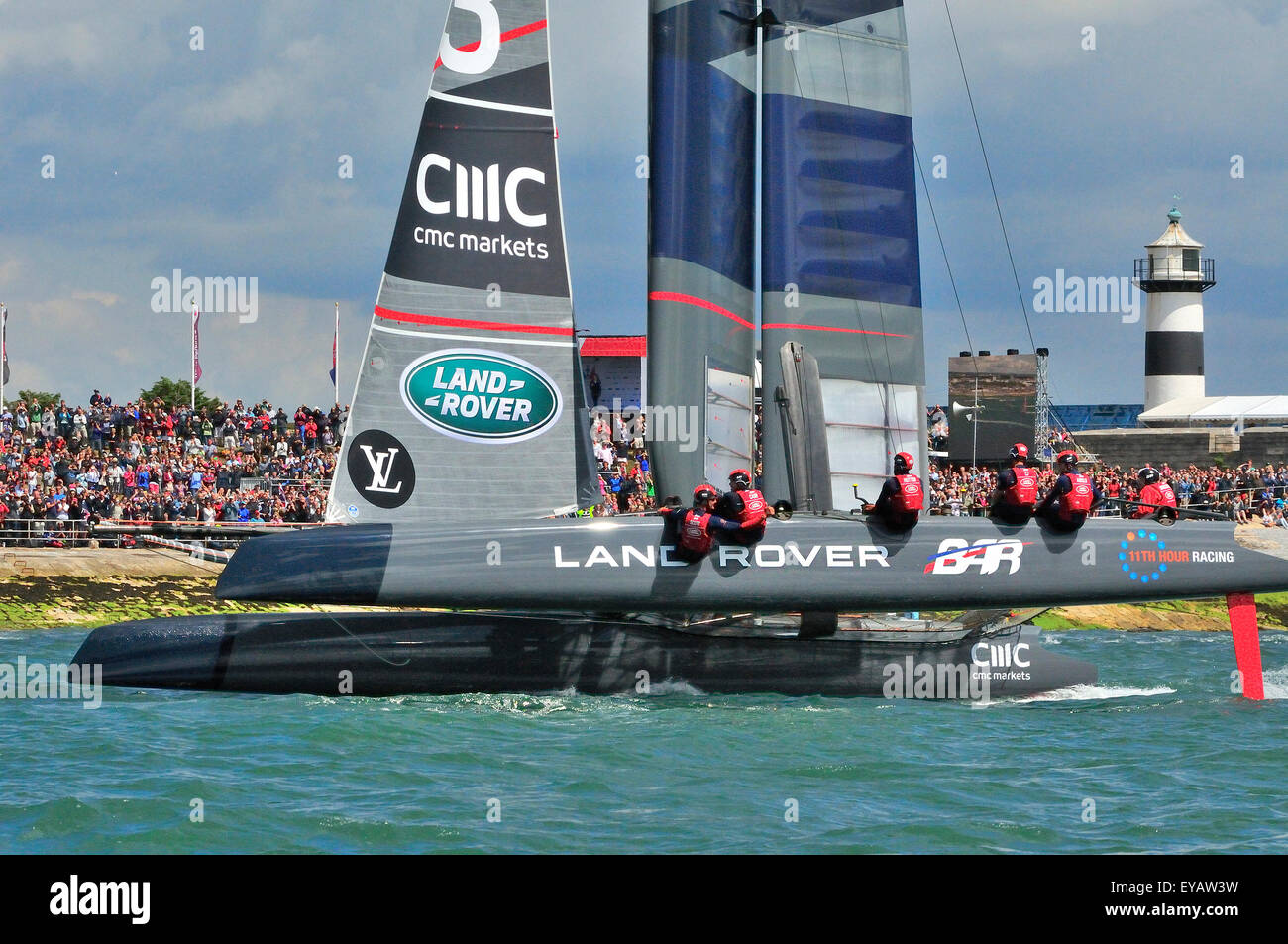 Portsmouth, Hampshire, UK - 25 July 2015 Louis Vuitton America's Cup World Series Portsmouth. Land Rover BAR led by Sir Ben Ainslie, wows the crowd by winning Races 1(of the 2 todays races )in the Louis Vuitton America's Cup World Series Portsmouth. Six teams are competing being Land Rover BAR led by Sir Ben Ainslie, Oracle Team USA, Artemis Racing from Sweden, Emirates Team New Zealand, SoftBank Team Japan, and Groupama Team France all sailing the 'flying' AC45f. Credit:  Gary Blake /Alamy Live News Stock Photo