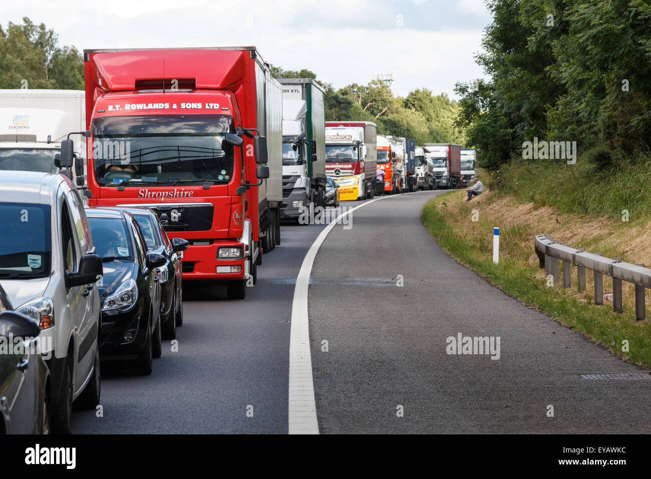 Traffic Jam on the M40 Motorway.  Cars and Lorries are stationary next to the hard shoulder Stock Photo