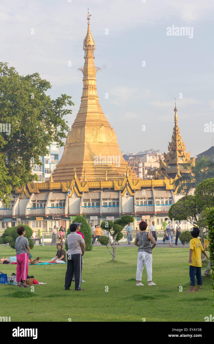 Yangon, Myanmar-May 8th 2014: People exercising in front of Sule Pagoda. Early morning is the favourite time for exercising. Stock Photo