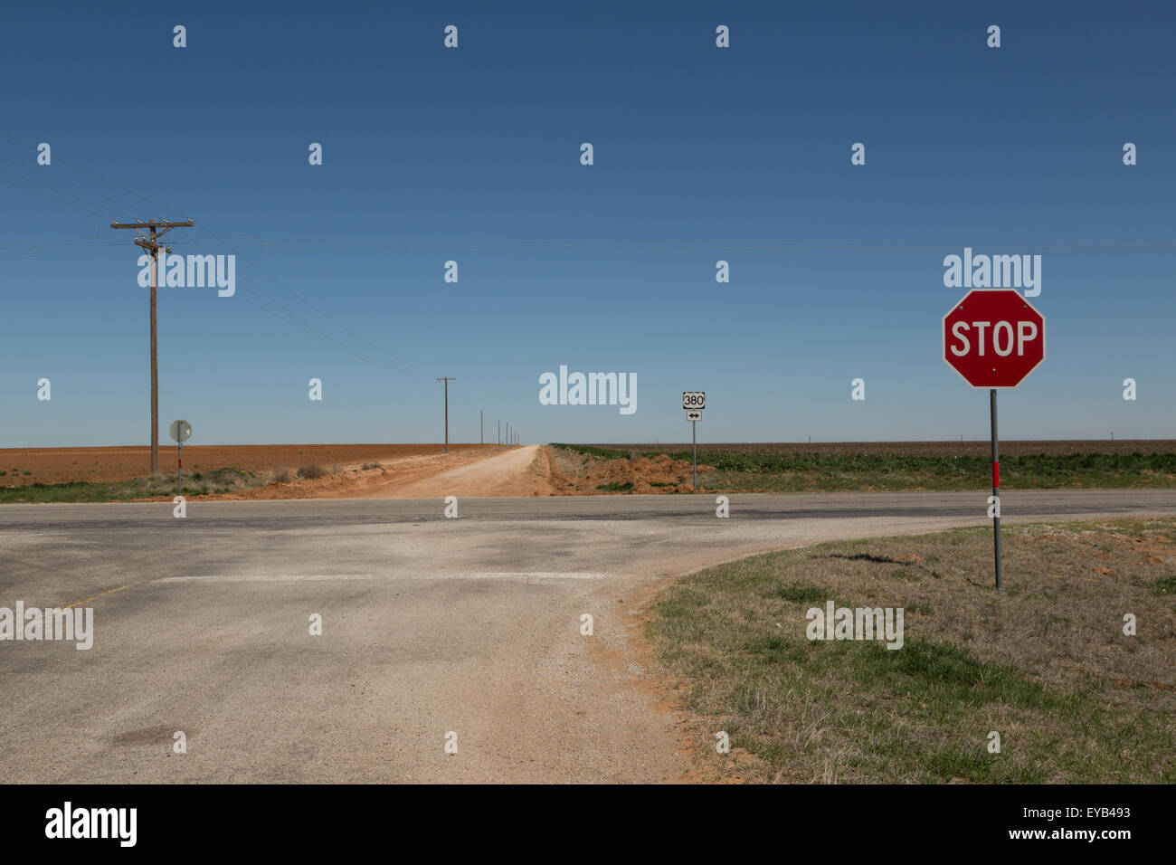 A photograph of a rural intersection in the Texas South Plains, USA